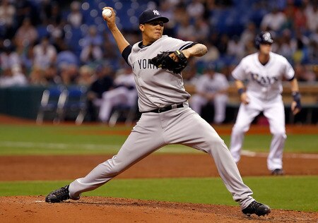 ST PETERSBURG, FL - SEPTEMBER 26:  Pitcher Hector Noesi #64 of the New York Yankees pitches against the Tampa Bay Rays during the game at Tropicana Field on September 26, 2011 in St. Petersburg, Florida.  <br /><br /><span class="help">(Photo by J. Meric/Getty Images)</span>