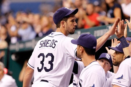 ST. PETERSBURG, FL - SEPTEMBER 26:  Pitcher James Shields #33 of the Tampa Bay Rays is congratulated after he is replaced against the New York Yankees during the game at Tropicana Field on September 26, 2011 in St. Petersburg, Florida.  <br /><br /><span class="help">(Photo by J. Meric/Getty Images)</span>