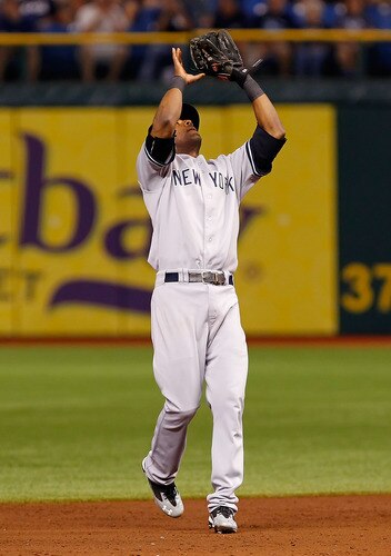 ST. PETERSBURG, FL - SEPTEMBER 27:  Infielder Eduardo Nunez #26 of the New York Yankees catches a fly ball from the Tampa Bay Rays during the game at Tropicana Field on September 27, 2011 in St. Petersburg, Florida.  <br /><br /><span class="help">(Photo by J. Meric/Getty Images)</span>