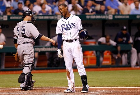 ST. PETERSBURG, FL - SEPTEMBER 27:  Outfielder B.J. Upton #2 of the Tampa Bay Rays questions his third called strike against the New York Yankees during the game at Tropicana Field on September 27, 2011 in St. Petersburg, Florida.  <br /><br /><span class="help">(Photo by J. Meric/Getty Images)</span>