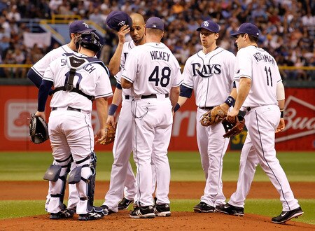 ST. PETERSBURG, FL - SEPTEMBER 28:  Pitching coach Jim Hickey #48 of the Tampa Bay Rays talks with David Price #14 during the game against the New York Yankees at Tropicana Field on September 28, 2011 in St. Petersburg, Florida.  <br /><br /><span class="help">(Photo by J. Meric/Getty Images)</span>