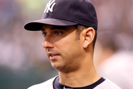 ST. PETERSBURG, FL - SEPTEMBER 28:  Jorge Posada #20 of the New York Yankees watches his team against the Tampa Bay Rays during the game at Tropicana Field on September 28, 2011 in St. Petersburg, Florida.  <br /><br /><span class="help">(Photo by J. Meric/Getty Images)</span>