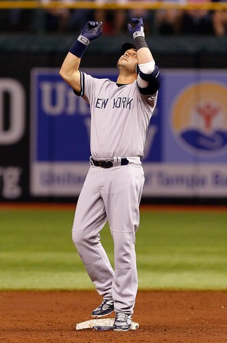 ST. PETERSBURG, FL - SEPTEMBER 28:  Nick Swisher #33 of the New York Yankees is reacts after his double against the Tampa Bay Rays during the game at Tropicana Field on September 28, 2011 in St. Petersburg, Florida.  <br /><br /><span class="help">(Photo by J. Meric/Getty Images)</span>