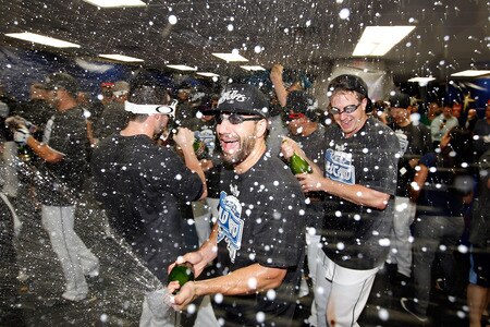 ST PETERSBURG, FL - SEPTEMBER 28:  Russ Canzler #45 of the Tampa Bay Rays celebrates the Rays victory over the New York Yankees at Tropicana Field on September 28, 2011 in St. Petersburg, Florida.  <br /><br /><span class="help">(Photo by J. Meric/Getty Images)</span>