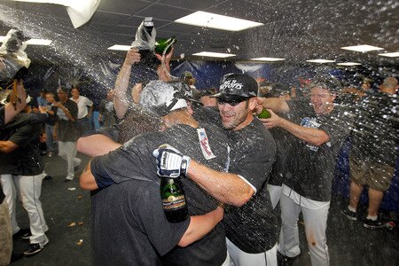 ST. PETERSBURG, FL - SEPTEMBER 28:  Designated hitter Johnny Damon #22 of the Tampa Bay Rays celebrates the Rays' victory over the New York Yankees during the game at Tropicana Field on September 28, 2011 in St. Petersburg, Florida.  <br /><br /><span class="help">(Photo by J. Meric/Getty Images)</span>