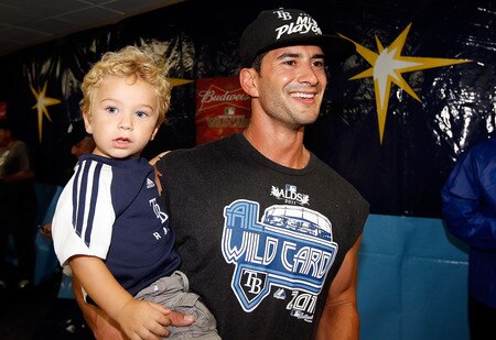 ST PETERSBURG, FL - SEPTEMBER 28:  Outfielder Justin Ruggiano #16 of the Tampa Bay Rays celebrates the Rays victory over the New York Yankees at Tropicana Field on September 28, 2011 in St. Petersburg, Florida.  <br /><br /><span class="help">(Photo by J. Meric/Getty Images)</span>