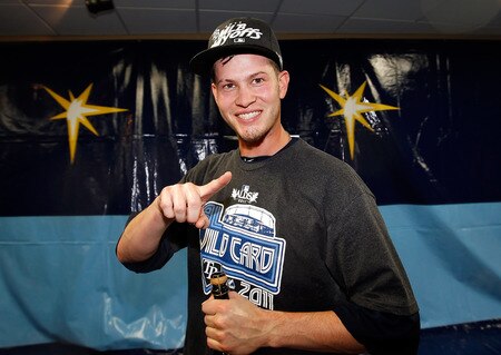 ST PETERSBURG, FL - SEPTEMBER 28:  Infielder Reid Brignac #15 of the Tampa Bay Rays celebrates the Rays victory over the New York Yankees at Tropicana Field on September 28, 2011 in St. Petersburg, Florida.  <br /><br /><span class="help">(Photo by J. Meric/Getty Images)</span>