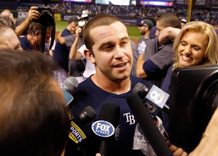 ST PETERSBURG, FL - SEPTEMBER 28:  Evan Longoria #3 of the Tampa Bay Rays is interviewed by the media after the Rays victory over the New York Yankees at Tropicana Field on September 28, 2011 in St. Petersburg, Florida.  <br /><br /><span class="help">(Photo by J. Meric/Getty Images)</span>
