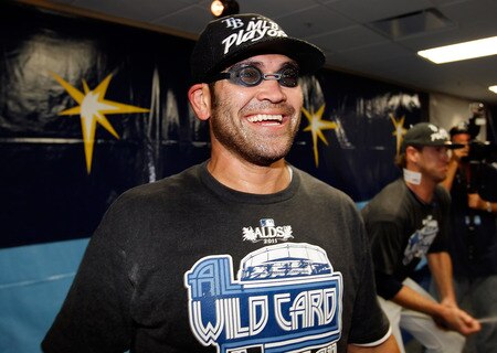 ST PETERSBURG, FL - SEPTEMBER 28:  Designated hitter Johnny Damon #22 of the Tampa Bay Rays celebrates the Rays victory over the New York Yankees at Tropicana Field on September 28, 2011 in St. Petersburg, Florida.  <br /><br /><span class="help">(Photo by J. Meric/Getty Images)</span>