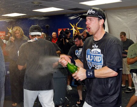 ST PETERSBURG, FL - SEPTEMBER 28:  Ben Zobrist #18 of the Tampa Bay Rays celebrates the Rays victory over the New York Yankees at Tropicana Field on September 28, 2011 in St. Petersburg, Florida.  <br /><br /><span class="help">(Photo by J. Meric/Getty Images)</span>