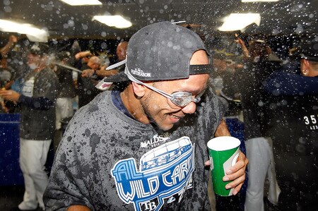 ST PETERSBURG, FL - SEPTEMBER 28:  Pitcher Juan Cruz #37 of the Tampa Bay Rays celebrates the Rays victory over the New York Yankees at Tropicana Field on September 28, 2011 in St. Petersburg, Florida.  <br /><br /><span class="help">(Photo by J. Meric/Getty Images)</span>