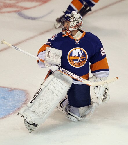BRIDGEPORT, CT - OCTOBER 01:  Evgeni Nabokov #20 of the New York Islanders tends the net in warmups prior to the game against the Boston Bruins at the Webster Bank Arena on October 1, 2011 in Bridgeport, Connecticut.  <br /><br /><span class="help">(Photo by Bruce Bennett/Getty Images)</span>