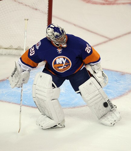 BRIDGEPORT, CT - OCTOBER 01:  Evgeni Nabokov #20 of the New York Islanders tends the net in warmups prior to the game against the Boston Bruins at the Webster Bank Arena on October 1, 2011 in Bridgeport, Connecticut.  <br /><br /><span class="help">(Photo by Bruce Bennett/Getty Images)</span>