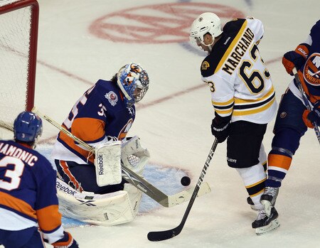 BRIDGEPORT, CT - OCTOBER 01: Al Montoya #35 of the New York Islanders makes the save on Brad Marchand #63 of the Boston Bruins at the Webster Bank Arena on October 1, 2011 in Bridgeport, Connecticut.  <br /><br /><span class="help">(Photo by Bruce Bennett/Getty Images)</span>