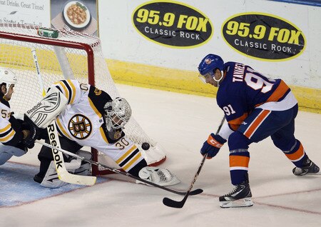BRIDGEPORT, CT - OCTOBER 01: John Tavares #91 of the New York Islanders is stopped by Tim Thomas #30 of the Boston Bruins at the Webster Bank Arena on October 1, 2011 in Bridgeport, Connecticut.  <br /><br /><span class="help">(Photo by Bruce Bennett/Getty Images)</span>