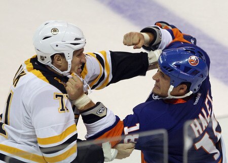 BRIDGEPORT, CT - OCTOBER 01:  Chris Clark #71 of the Boston Bruins fights with Michael Haley #18 of the New York Islanders at the Webster Bank Arena on October 1, 2011 in Bridgeport, Connecticut.  <br /><br /><span class="help">(Photo by Bruce Bennett/Getty Images)</span>