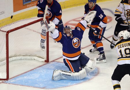 BRIDGEPORT, CT - OCTOBER 01:  Evgeni Nabokov #20 of the New York Islanders makes a third period save against the Boston Bruins at the Webster Bank Arena on October 1, 2011 in Bridgeport, Connecticut. The Bruins defeated the Islanders 3-2.  <br /><br /><span class="help">(Photo by Bruce Bennett/Getty Images)</span>