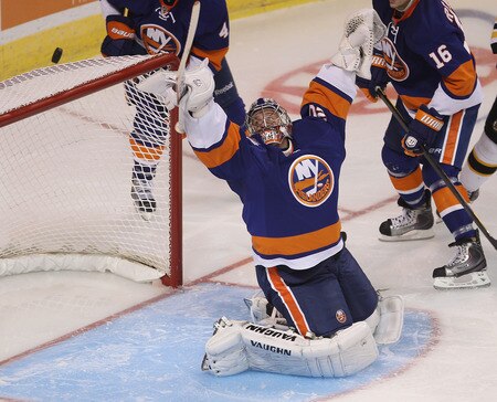 BRIDGEPORT, CT - OCTOBER 01:  Evgeni Nabokov #20 of the New York Islanders makes a third period save against the Boston Bruins at the Webster Bank Arena on October 1, 2011 in Bridgeport, Connecticut. The Bruins defeated the Islanders 3-2.  <br /><br /><span class="help">(Photo by Bruce Bennett/Getty Images)</span>