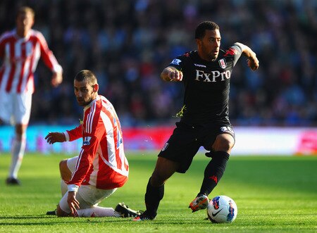 STOKE ON TRENT, ENGLAND - OCTOBER 15: Moussa Dembele of Stoke City breaks from Rory Delap of Stoke City during the Barclays Premier League match between Stoke City and Fulham at Britannia Stadium on October 15, 2011 in Stoke on Trent, England.  <br /><br /><span class="help">(Photo by Laurence Griffiths/Getty Images)</span>