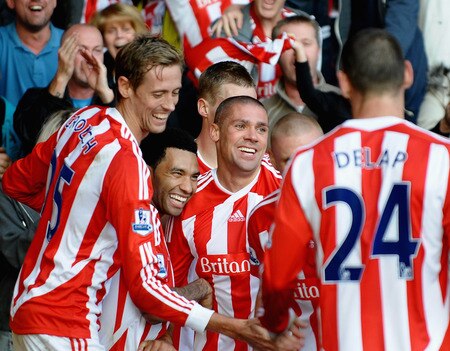 STOKE ON TRENT, ENGLAND - OCTOBER 15:  Jonathan Walters of Stoke City is mobbed after scoring the first goal during the Barclays Premier League match between Stoke City and Fulham at Britannia Stadium on October 15, 2011 in Stoke on Trent, England.  <br /><br /><span class="help">(Photo by Laurence Griffiths/Getty Images)</span>