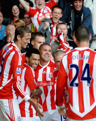 STOKE ON TRENT, ENGLAND - OCTOBER 15:  Jonathan Walters of Stoke City is mobbed after scoring the first goal during the Barclays Premier League match between Stoke City and Fulham at Britannia Stadium on October 15, 2011 in Stoke on Trent, England.  <br /><br /><span class="help">(Photo by Laurence Griffiths/Getty Images)</span>