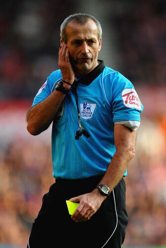 STOKE ON TRENT, ENGLAND - OCTOBER 15: Referee Martin Atkinson in action during the Barclays Premier League match between Stoke City and Fulham at Britannia Stadium on October 15, 2011 in Stoke on Trent, England.  <br /><br /><span class="help">(Photo by Laurence Griffiths/Getty Images)</span>