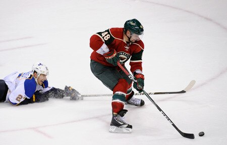 ST PAUL, MN - NOVEMBER 5: Alex Pietrangelo #27 of the St. Louis Blues falls to the ice as Guillaume Latendresse #48 of the Minnesota Wild handles the puck in the second period on November 5, 2011 at Xcel Energy Center in Minneapolis, Minnesota. The Wild defeated the Blues 2-1 and Latendresse scored on the play. <br /><br /><span class="help">(Photo by Hannah Foslien/Getty Images)</span>
