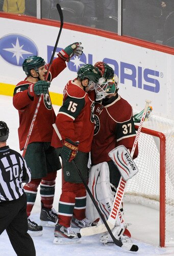 ST PAUL, MN - NOVEMBER 5: Marco Scandella #6, Dany Heatley #15 and Josh Harding #37 of the Minnesota Wild celebrate a win against the St. Louis Blues on November 5, 2011 at Xcel Energy Center in Minneapolis, Minnesota. The Wild defeated the Blues 2-1. <br /><br /><span class="help">(Photo by Hannah Foslien/Getty Images)</span>