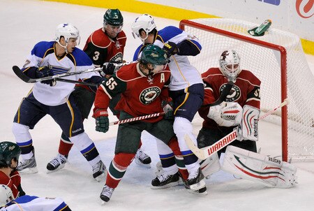 ST PAUL, MN - NOVEMBER 5: Josh Harding #37 of the Minnesota Wild stops the puck with his glove as Vladimir Sobotka #17 and Jason Arnott #44 of the St. Louis Blues fight for positioning in front of the net with Dany Heatley #15 and Marek Zidlicky #3 of the Minnesota Wild in the third period on November 5, 2011 at Xcel Energy Center in Minneapolis, Minnesota. The Wild defeated the Blues 2-1. <br /><br /><span class="help">(Photo by Hannah Foslien/Getty Images)</span>