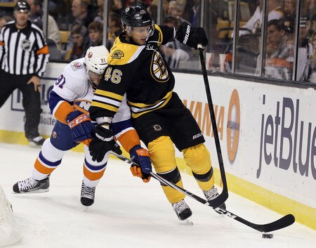 BOSTON, MA - NOVEMBER 07:  David Krejci #46 of the Boston Bruins and John Tavares #91 of the New York Islanders on November 7, 2011 at TD Garden in Boston, Massachusetts.  <br /><br /><span class="help">(Photo by Elsa/Getty Images)</span>