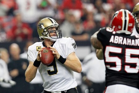 ATLANTA, GA - NOVEMBER 13:  Quarterback Drew Brees #9 of the New Orleans Saints drops back to pass against the Atlanta Falcons at Georgia Dome on November 13, 2011 in Atlanta, Georgia.  <br /><br /><span class="help">(Photo by Kevin C. Cox/Getty Images)</span>