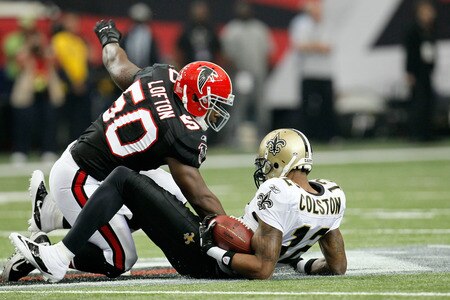 ATLANTA, GA - NOVEMBER 13:  Marques Colston #12 of the New Orleans Saints pulls down a first down catch against Curtis Lofton #50 of the Atlanta Falcons at Georgia Dome on November 13, 2011 in Atlanta, Georgia.  <br /><br /><span class="help">(Photo by Kevin C. Cox/Getty Images)</span>