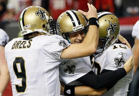 ATLANTA, GA - NOVEMBER 13:  John Kasay #2 of the New Orleans Saints celebrates kicking the game-winning field goal in overtime against the Atlanta Falcons with Drew Brees #9 and Chase Daniel #10 at Georgia Dome on November 13, 2011 in Atlanta, Georgia.  <br /><br /><span class="help">(Photo by Kevin C. Cox/Getty Images)</span>