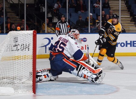 UNIONDALE, NY - NOVEMBER 19: Zdeno Chara #33 of the Boston Bruins scores a third period goal against Anders Nilsson #45 of the New York Islanders at the Nassau Veterans Memorial Coliseum on November 19, 2011 in Uniondale, New York. The Bruins defeated the Islanders 6-0. <br /><br /><span class="help">(Photo by Bruce Bennett/Getty Images)</span>