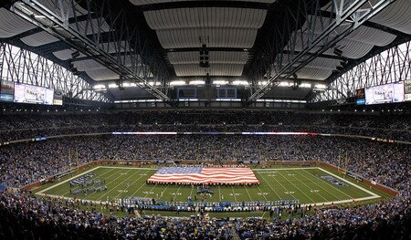 DETROIT, MI - NOVEMBER 24: An American flag is unfurled on Ford Field prior to the start of the Thanksgiving Day Game between the Green Bay Packers and the Detroit Lions at Ford Field on November 24, 2011 in Detroit, Michigan.  <br /><br /><span class="help">(Photo by Leon Halip/Getty Images)</span>