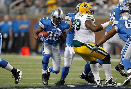 DETROIT, MI - NOVEMBER 24:  Running back Kevin Smith #30 of the Detroit Lions runs the ball in the first quarter against the Green Bay Packers during the Thanksgiving Day game at Ford Field on November 24, 2011 in Detroit, Michigan.  <br /><br /><span class="help">(Photo by Gregory Shamus/Getty Images)</span>