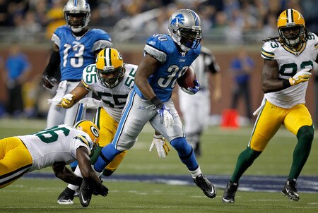 DETROIT, MI - NOVEMBER 24:  Running back Kevin Smith #30 of the Detroit Lions runs the ball in the first quarter against the Green Bay Packers during the Thanksgiving Day game at Ford Field on November 24, 2011 in Detroit, Michigan.  <br /><br /><span class="help">(Photo by Gregory Shamus/Getty Images)</span>