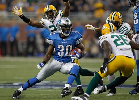 DETROIT, MI - NOVEMBER 24:  Running back Kevin Smith #30 of the Detroit Lions runs the ball in the first quarter against the Green Bay Packers during the Thanksgiving Day game at Ford Field on November 24, 2011 in Detroit, Michigan.  <br /><br /><span class="help">(Photo by Gregory Shamus/Getty Images)</span>