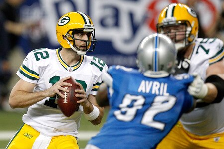 DETROIT, MI - NOVEMBER 24:  Quarterback Aaron Rodgers #12 of the Green Bay Packers looks to pass against the Detroit Lions in the first half of the Thanksgiving Day game at Ford Field on November 24, 2011 in Detroit, Michigan.  <br /><br /><span class="help">(Photo by Gregory Shamus/Getty Images)</span>