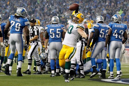 DETROIT, MI - NOVEMBER 24:  Running back John Kuhn #30 of the Green Bay Packers celebrates his one-yard touchdown run in the third quarter against the Detroit Lions during the Thanksgiving Day game at Ford Field on November 24, 2011 in Detroit, Michigan.  <br /><br /><span class="help">(Photo by Gregory Shamus/Getty Images)</span>
