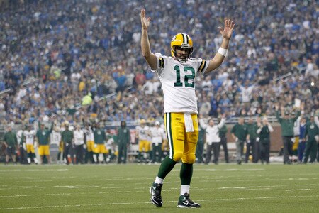 DETROIT, MI - NOVEMBER 24:  Quarterback Aaron Rodgers #12 of the Green Bay Packers reacts in the third quarter against the Detroit Lions during the Thanksgiving Day game at Ford Field on November 24, 2011 in Detroit, Michigan.  <br /><br /><span class="help">(Photo by Gregory Shamus/Getty Images)</span>