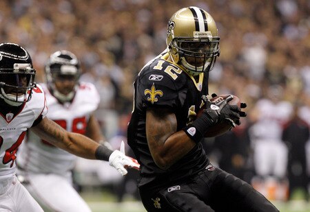 NEW ORLEANS, LA - DECEMBER 26:  Wide receiver Marques Colston #12 of the New Orleans Saints catches an eight-yard touchdown pass in the second quarter against the Atlanta Falcons at the Mercedes-Benz Superdome on December 26, 2011 in New Orleans, Louisiana.  <br /><br /><span class="help">(Photo by Chris Graythen/Getty Images)</span>