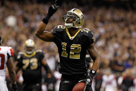 NEW ORLEANS, LA - DECEMBER 26:  Wide receiver Marques Colston #12 of the New Orleans Saints reacts after he catches an eight-yard touchdown pass in the second quarter against the Atlanta Falcons at the Mercedes-Benz Superdome on December 26, 2011 in New Orleans, Louisiana.  <br /><br /><span class="help">(Photo by Chris Graythen/Getty Images)</span>