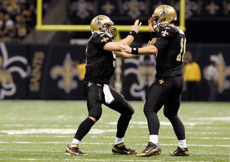 NEW ORLEANS, LA - DECEMBER 26:  Quarterback Drew Brees #9 of the New Orleans Saints reacts with quarterback Chase Daniel #10 in the first half against the Atlanta Falcons at the Mercedes-Benz Superdome on December 26, 2011 in New Orleans, Louisiana.  <br /><br /><span class="help">(Photo by Chris Graythen/Getty Images)</span>