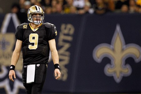 NEW ORLEANS, LA - DECEMBER 26:  Quarterback Drew Brees #9 of the New Orleans Saints looks on in the first half against the Atlanta Falcons at the Mercedes-Benz Superdome on December 26, 2011 in New Orleans, Louisiana.  <br /><br /><span class="help">(Photo by Chris Graythen/Getty Images)</span>