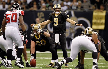 NEW ORLEANS, LA - DECEMBER 26:  Quarterback Drew Brees #9 of the New Orleans Saints calls out from under center in the second quarter against the Atlanta Falcons at the Mercedes-Benz Superdome on December 26, 2011 in New Orleans, Louisiana.  <br /><br /><span class="help">(Photo by Chris Graythen/Getty Images)</span>