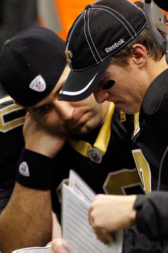 NEW ORLEANS, LA - DECEMBER 26:  (R-L) Quarterback Drew Brees #9 and quarterback Chase Daniel #10 of the New Orleans Saints talk on the bench in the second quarter against the Atlanta Falcons at the Mercedes-Benz Superdome on December 26, 2011 in New Orleans, Louisiana.  <br /><br /><span class="help">(Photo by Chris Graythen/Getty Images)</span>