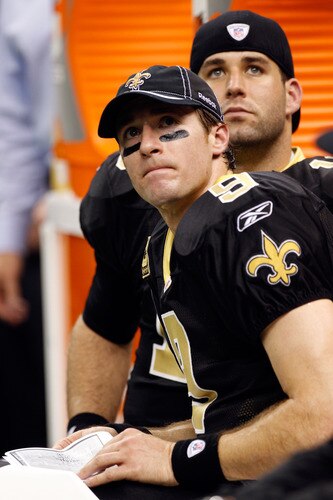 NEW ORLEANS, LA - DECEMBER 26:  (Front) Quarterback Drew Brees #9 and quarterback Chase Daniel #10 of the New Orleans Saints look from the bench in the second quarter against the Atlanta Falcons at the Mercedes-Benz Superdome on December 26, 2011 in New Orleans, Louisiana.  <br /><br /><span class="help">(Photo by Chris Graythen/Getty Images)</span>
