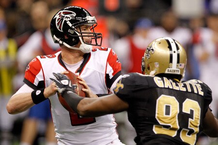 NEW ORLEANS, LA - DECEMBER 26:  Quarterback Matt Ryan #2 of the Atlanta Falcons looks to pass as defensive end Junior Galette #93 of the New Orleans Saints rushes in during the second quarter at the Mercedes-Benz Superdome on December 26, 2011 in New Orleans, Louisiana.  <br /><br /><span class="help">(Photo by Chris Graythen/Getty Images)</span>