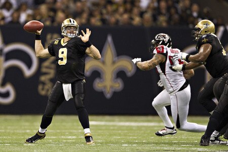 NEW ORLEANS, LA - DECEMBER 26:   Quarterback Drew Brees #9 of the New Orleans Saints throws a pass against the Atlanta Falcons at Mercedes-Benz Superdome on December 26, 2011 in New Orleans, Louisiana.  <br /><br /><span class="help">(Photo by Wesley Hitt/Getty Images)</span>